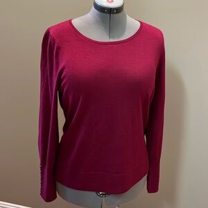 Woman’s long sleeve knit sweater